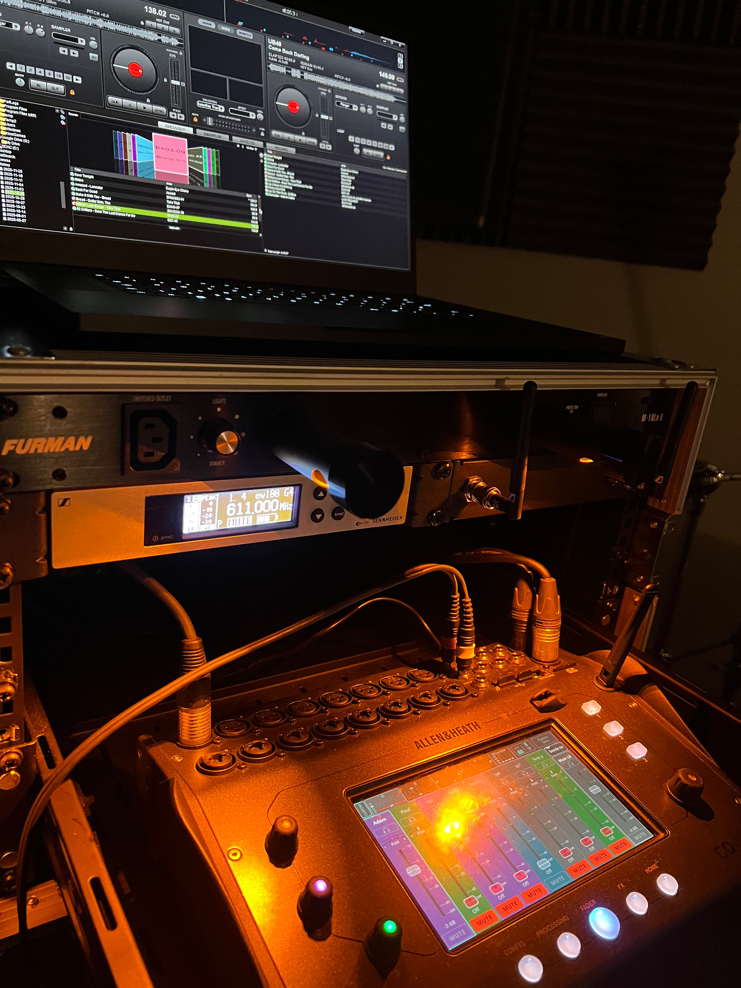 Professional audio equipment setup — Allen & Heath mixer, Sennheiser wireless, and DJ software